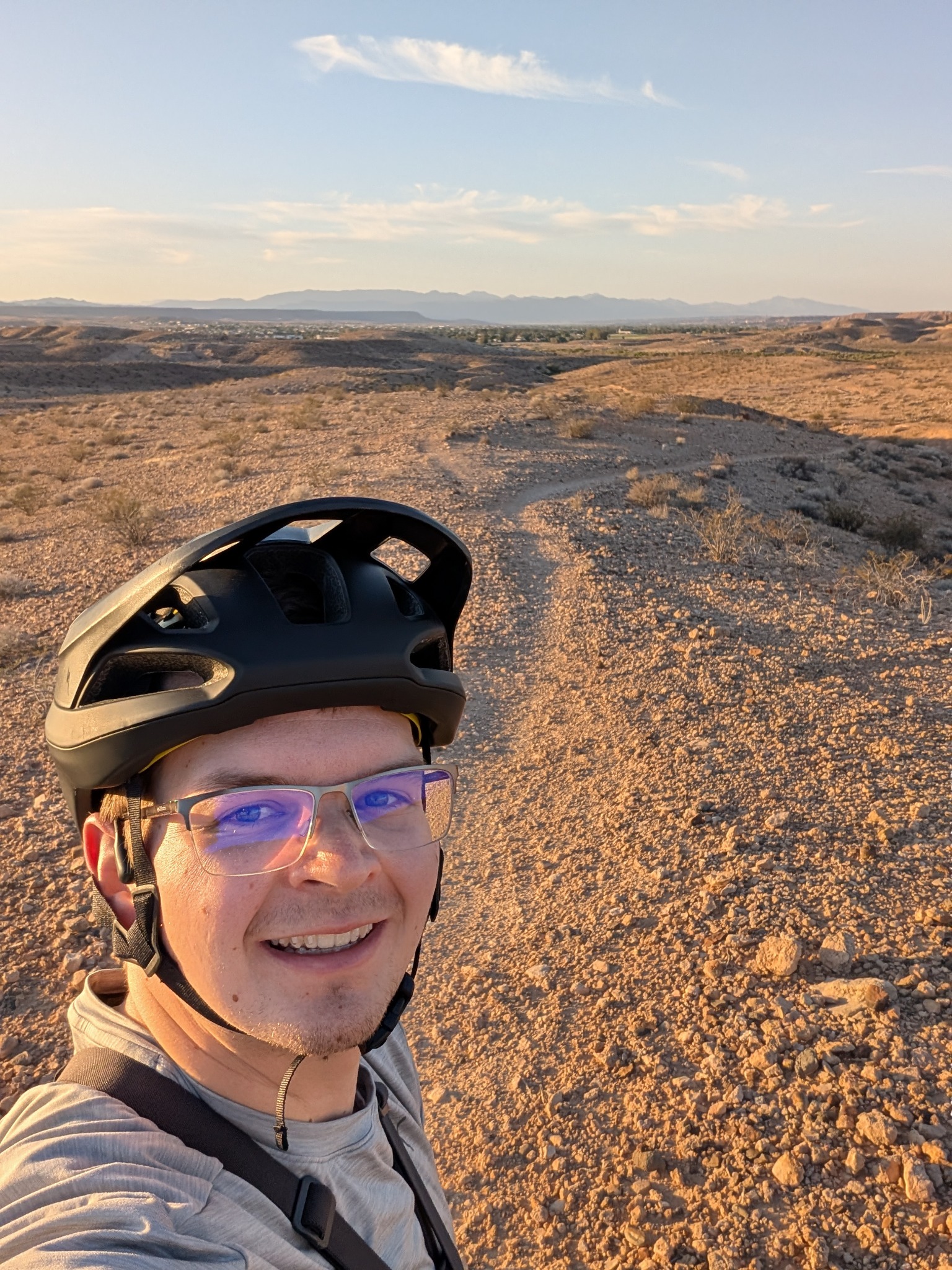 Tanner mountain biking on a desert trail